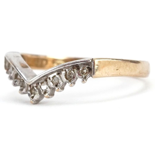 2193 - A 9ct two tone gold diamond wishbone ring, size L, 1.6g.