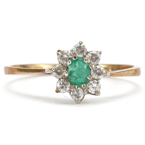 2368 - A 9ct gold emerald and clear stone flower head ring, size O/P, 1.2g.