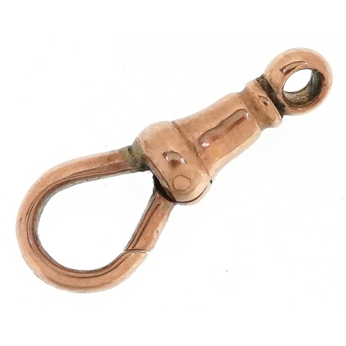 2497 - A 9ct rose gold dog clip clasp, 1.9cm in length, 1.1g.