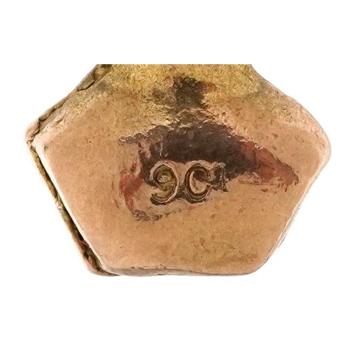 2327 - A 9ct gold charm in the form of a bust of a female, 2cm high, 3.1g.