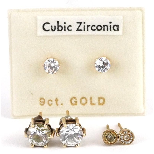 2502 - Three pairs of 9ct gold stud earrings set with diamonds and cubic zirconia, the largest 6.8mm in dia... 