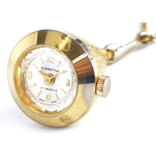 2213 - Eurastyle, ladies gold plated manual wind fob watch on a gold plated necklace, the dial 14mm in diam... 