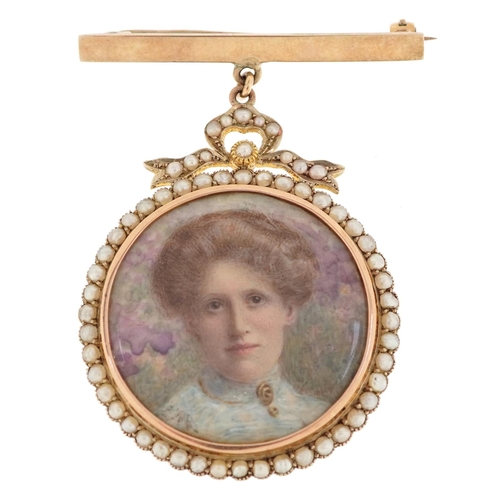 2002 - An Edwardian 9ct gold seed pearl open locket housing two hand painted portrait miniatures of a lady ... 