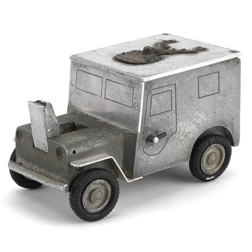 290 - A German Baier 1947 aluminium table cigarette lighter and box in the form of an army truck, 14cm in ... 