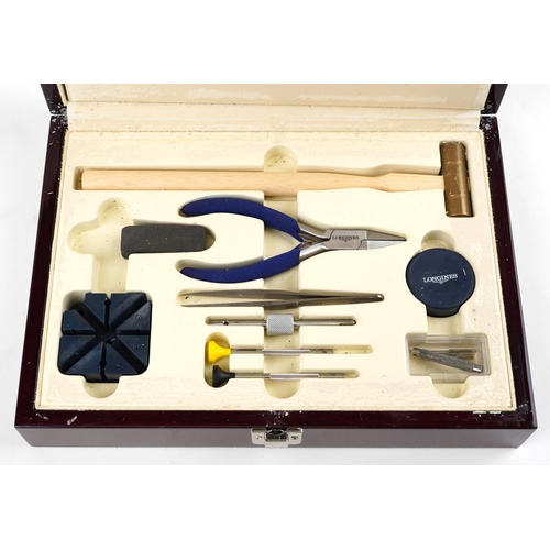 2576 - A Longines watch repair kit, cased, 28cm wide.