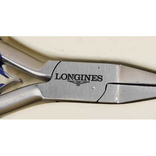 2576 - A Longines watch repair kit, cased, 28cm wide.