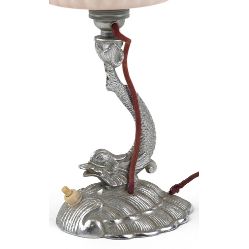 352 - An Art Deco plated table lamp in the form of a dolphin with opaline glass shade, 46cm high.