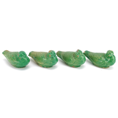 266 - Four Chinese green glazed pottery figures of seated birds, late 19th/early 20th century, 9cm in leng... 