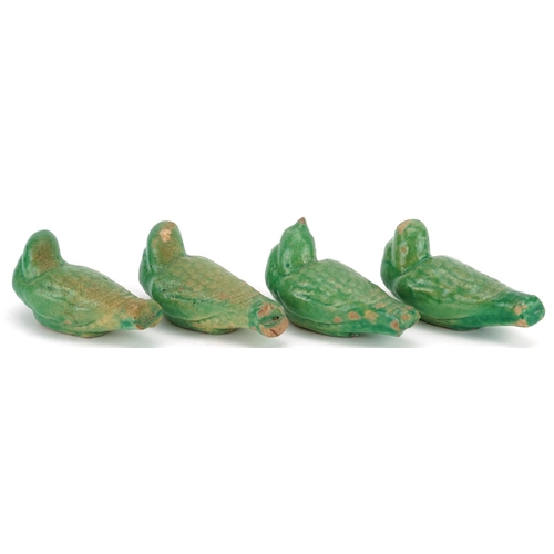 266 - Four Chinese green glazed pottery figures of seated birds, late 19th/early 20th century, 9cm in leng... 