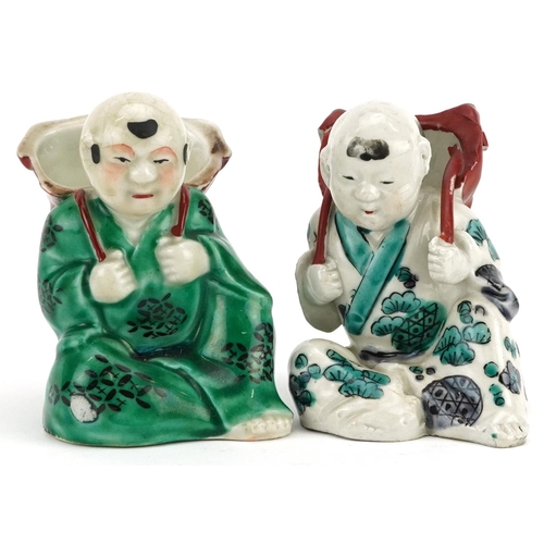 246 - A pair of Chinese hand painted porcelain figures, 20th century, 9cm high.