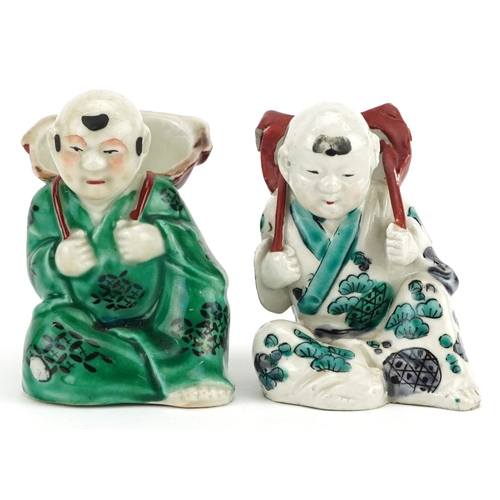 246 - A pair of Chinese hand painted porcelain figures, 20th century, 9cm high.