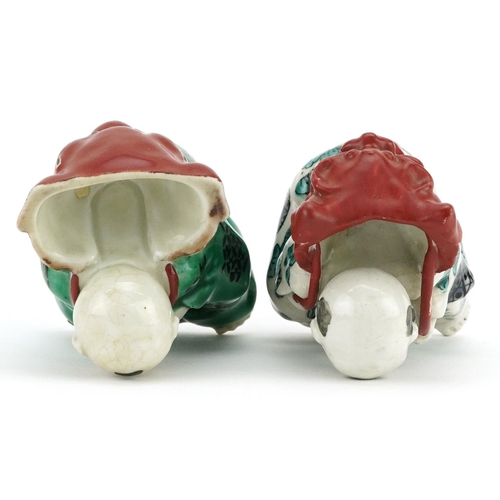 246 - A pair of Chinese hand painted porcelain figures, 20th century, 9cm high.