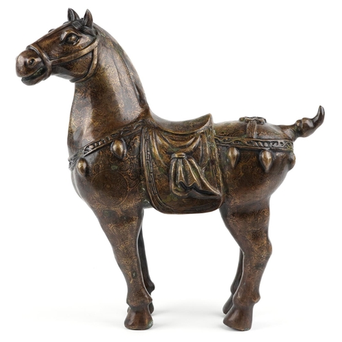 54 - A large Chinese bronze partially gilt study of a Tang horse, 39cm high, approximately 8.5kg