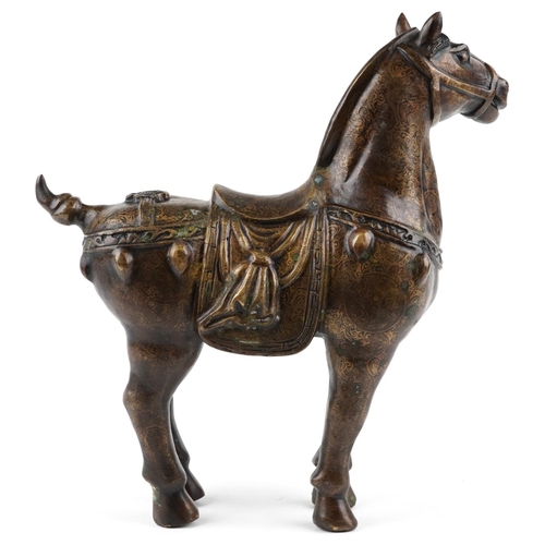 54 - A large Chinese bronze partially gilt study of a Tang horse, 39cm high, approximately 8.5kg