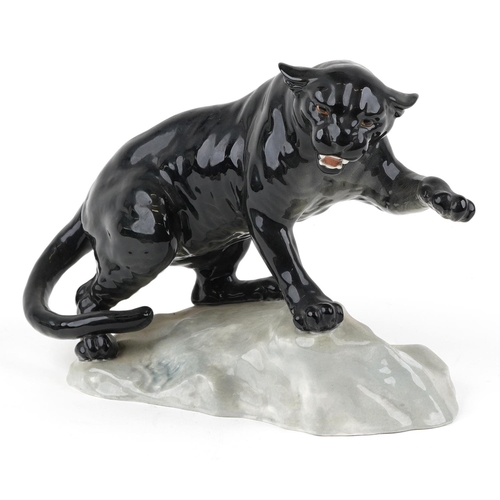 397 - A large Beswick study of a black panther numbered 1702, 30cm in length.