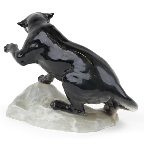 397 - A large Beswick study of a black panther numbered 1702, 30cm in length.