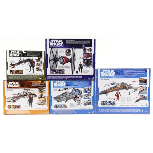 599 - Five as new Star Wars The Force Awakens collectables comprising a Desert Land Speeder, First Order S... 