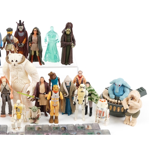 650 - A collection of vintage and later Star Wars action figures and accessories including R2-D2, Yoda, Ja... 