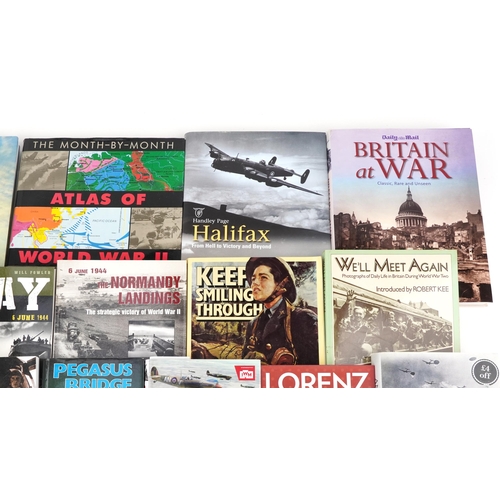 743 - A good collection of military interest books.