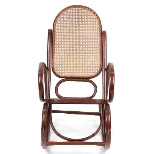 1049 - A mid 20th century bentwood rocking armchair with cane seat and back, possibly by Thonet, Austria, 1... 