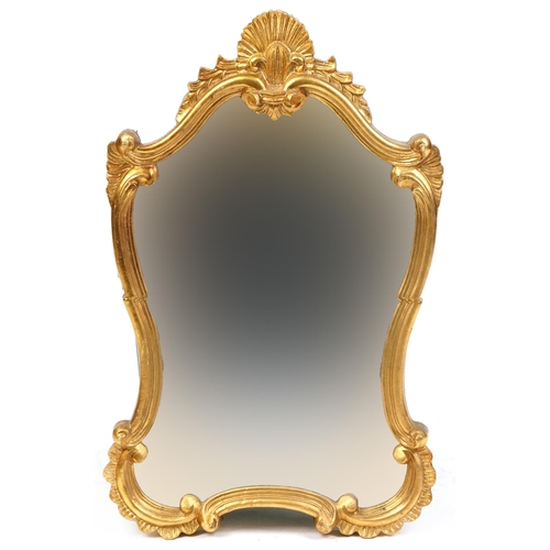 1068 - A late 20th century gilt framed wall mirror, 72cm x 45cm.