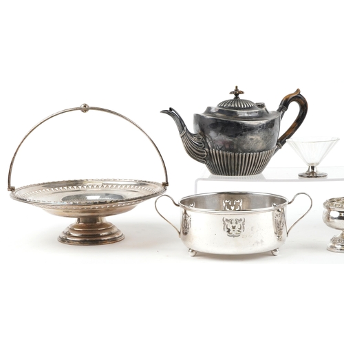 1198 - A group of Victorian and later silver plate including a Victorian demi fluted teapot and fruit baske... 