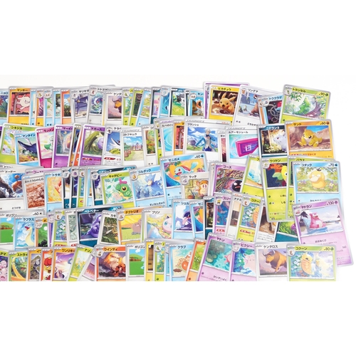 530 - A large collection of 2023 Japanese Pokémon trade cards, some holographic, approximately two hundred... 