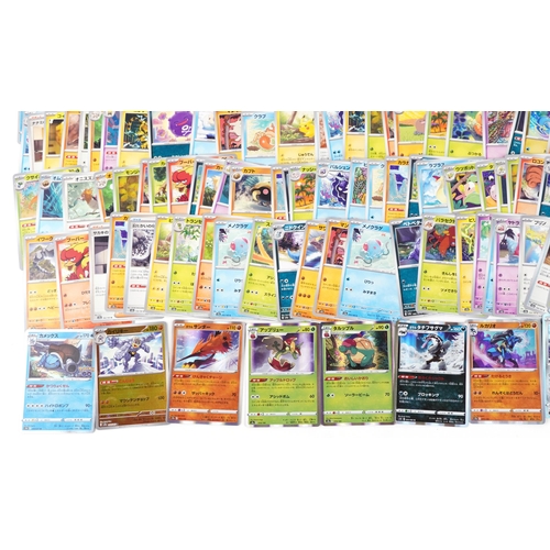 530 - A large collection of 2023 Japanese Pokémon trade cards, some holographic, approximately two hundred... 