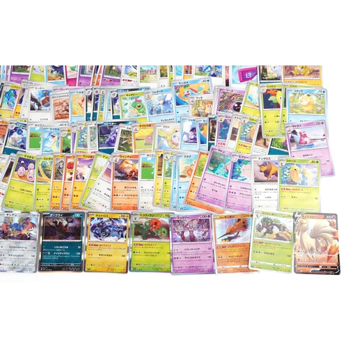 530 - A large collection of 2023 Japanese Pokémon trade cards, some holographic, approximately two hundred... 