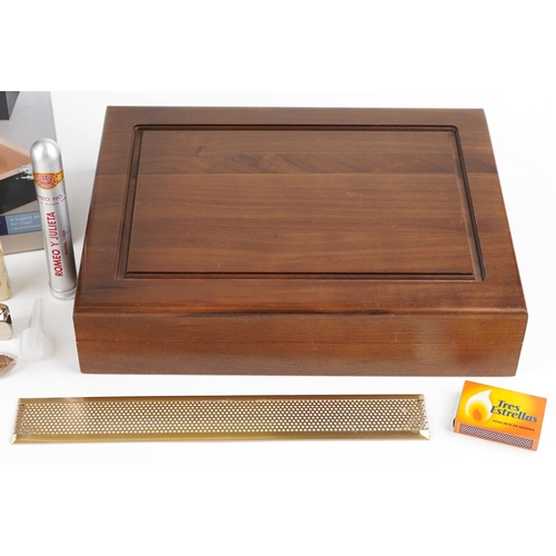 1179 - A TCM cigar humidor together with a similar cigar humidor, 29cm wide.