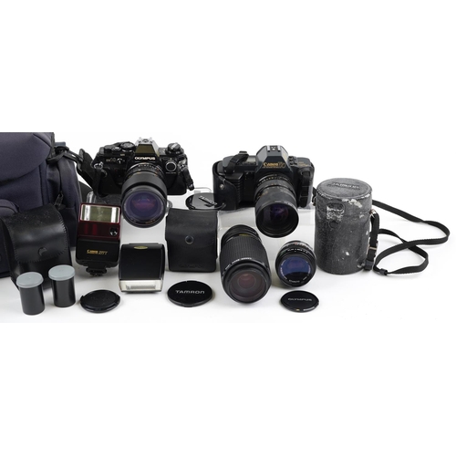 480 - A Olympus OM10 camera body together with a Hoya 62mm lens, a Canon zoom lens 75-200mm, a Canon T70 c... 