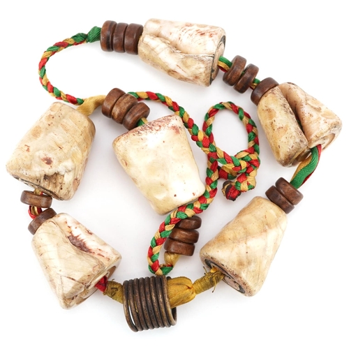 232 - An African tribal bone necklace, early 20th century, 33cm in length.