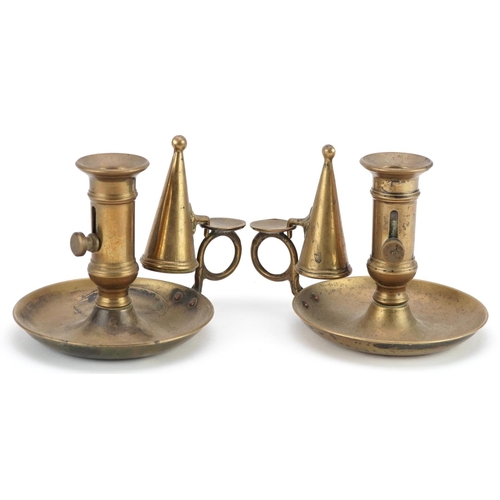 318 - A pair of Victorian brass chambersticks and snuffers, 10cm high.