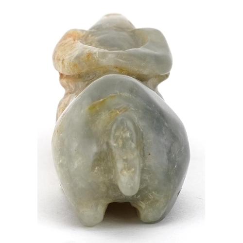 52 - A Chinese celadon and russet jade carving, possibly 18th century, in the form of a reclining water b... 