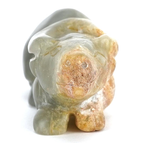 52 - A Chinese celadon and russet jade carving, possibly 18th century, in the form of a reclining water b... 