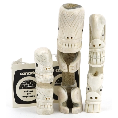 223 - A group of three Arctic Canadian carved bone totem figures by Gideon Taqaqiq, late 19th/early 20th c... 