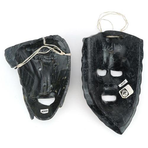 220 - Two Canadian Inuit carved stone masks, one by Kudlu Kellypalik, Arviat Community circa 2002, the oth... 