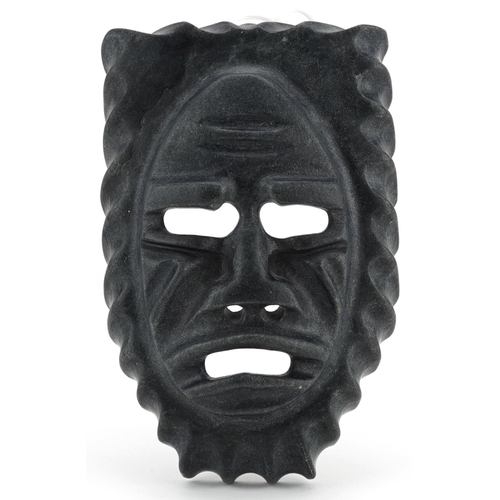 221 - A Canadian Inuit carved stone mask by Tony Kellypalik, circa 2006.