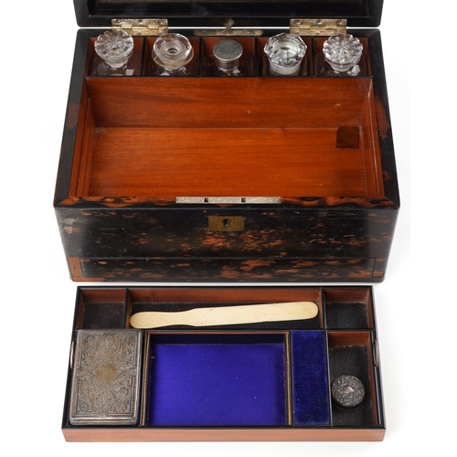 19 - A 19th century coromandel workbox with fitted interior, glass bottles, two with silver lids and secr... 