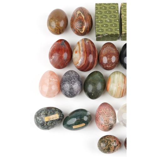 1332 - A collection of semi precious stone eggs and specimens including agate, rose quartz, serpentine marb... 