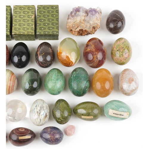 1332 - A collection of semi precious stone eggs and specimens including agate, rose quartz, serpentine marb... 