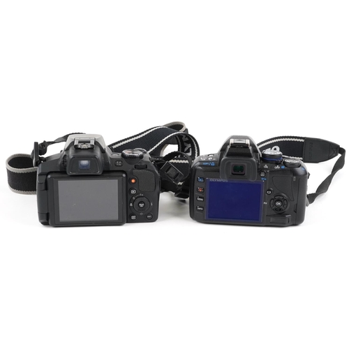 486 - Two digital cameras, one with box, comprising Fujifilm Finepix S1 and Olympus E-450.