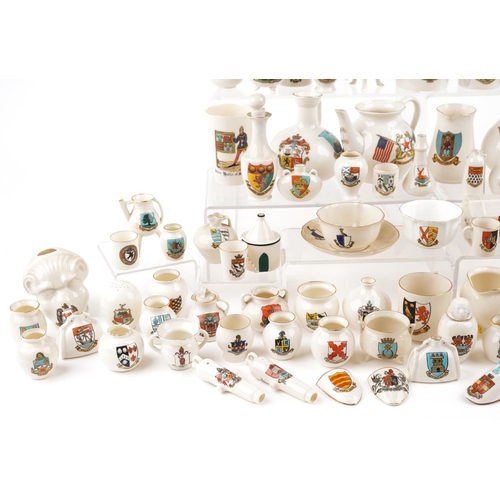 1305 - An extensive collection of predominantly W H Goss crested china.