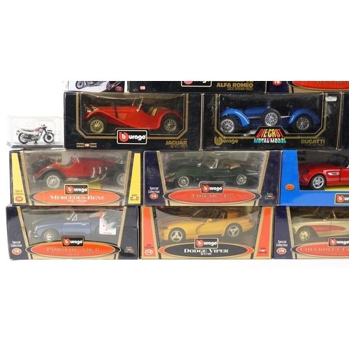 578 - A Collection of collector's diecast vehicles including 1:18 scale Bburago models - Jaguar SS100, Mer... 