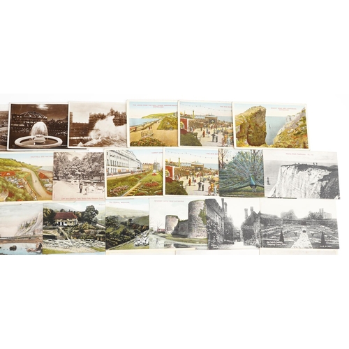 1563 - A collection of approximately thirty black and white, colour and reproduction postcards, predominant... 