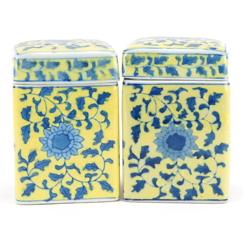 322 - A pair of Chinese famille jaune porcelain jars and covers, 20th century, of square section form, eac... 