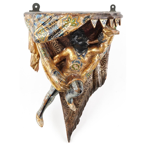 212A - A 19th century Venetian polychrome and gilded wall bracket modelled as a man blowing a horn, 42cm hi... 