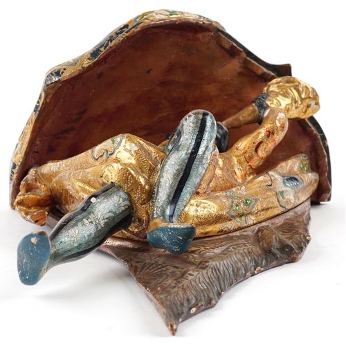 212A - A 19th century Venetian polychrome and gilded wall bracket modelled as a man blowing a horn, 42cm hi... 