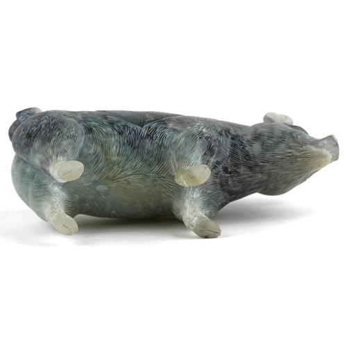 1325 - A Chinese carved hard stone figure of a standing pig, 20th century, bearing script, 12cm high x 23cm... 