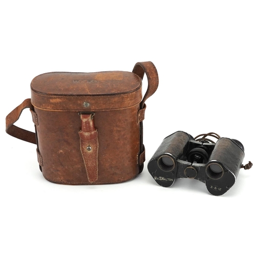 712 - A pair of Russian military interest World War I binoculars with leather case.